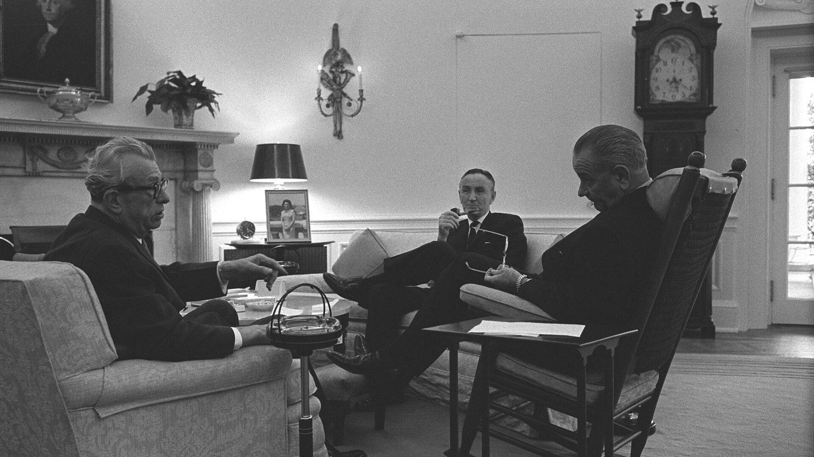 President Lyndon B. Johnson confers with Senators Everett Dirksen and Mike Mansfield